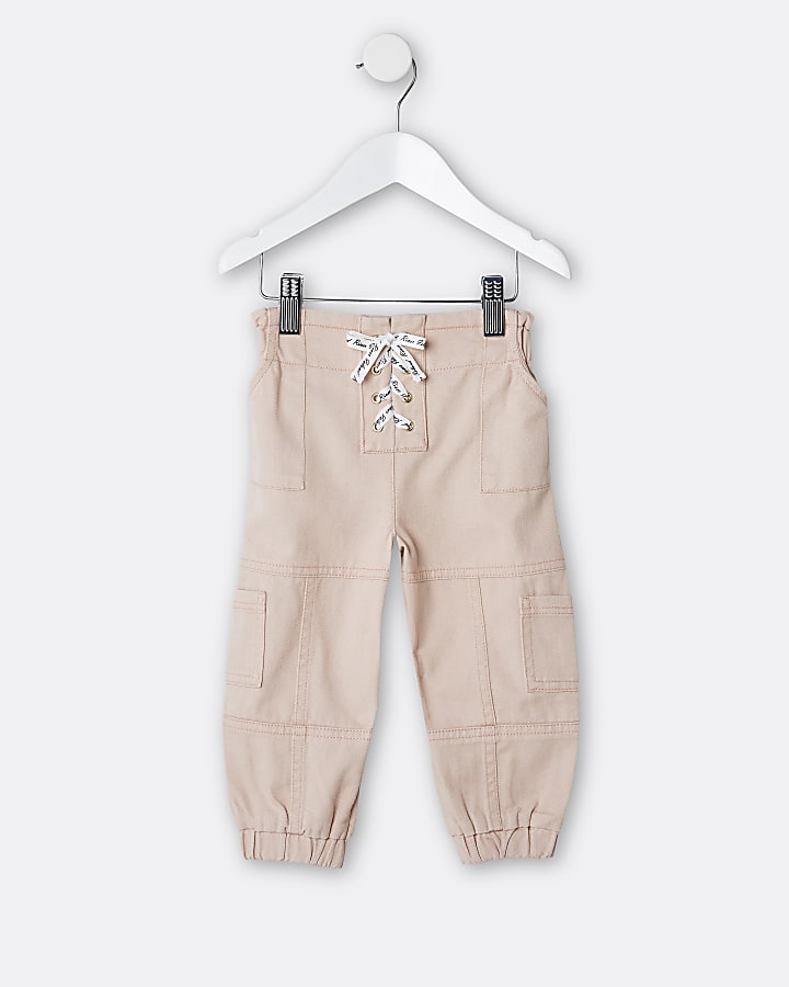 Mini girls pink lace up cargo trousers | River Island