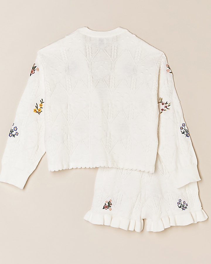 Girls white knitted cardigan and short outfit