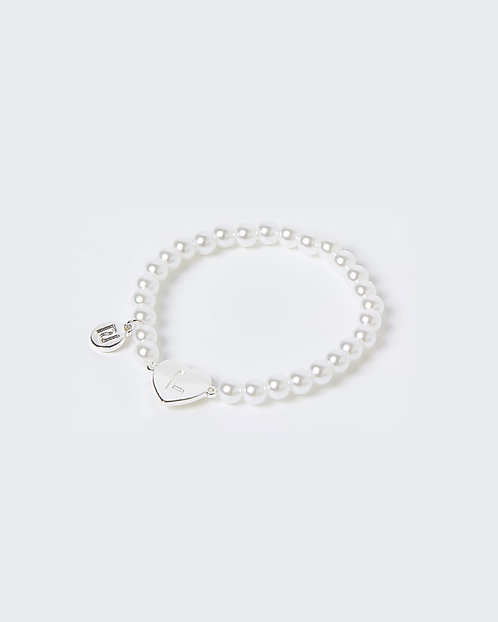 Girls white L initial bracelet