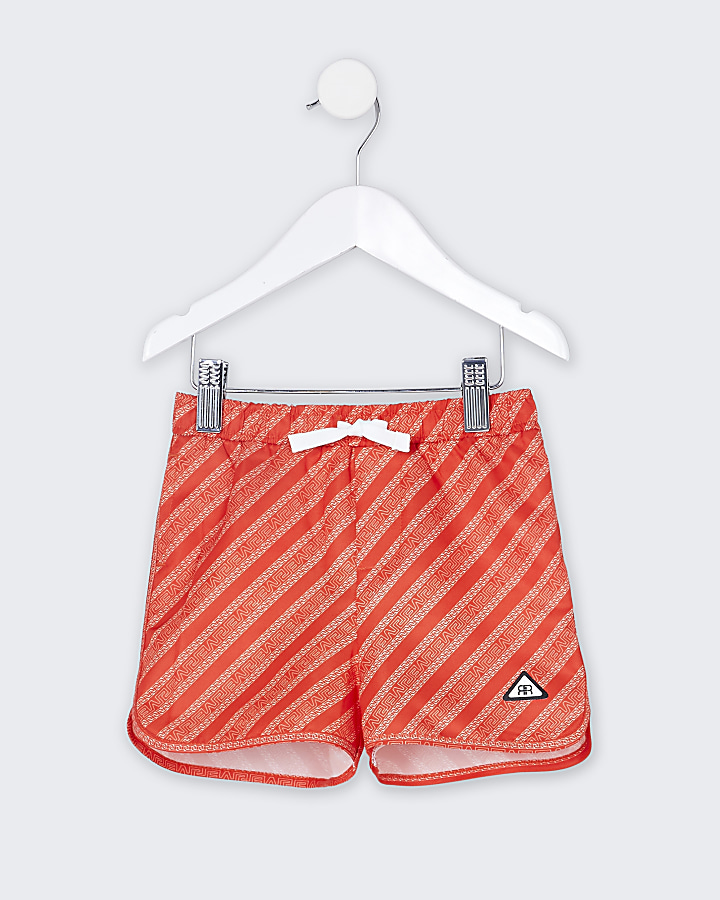Mini boys red RI monogram swim shorts