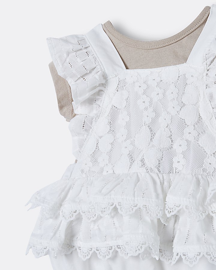 Baby girls cream lace frill romper outfit