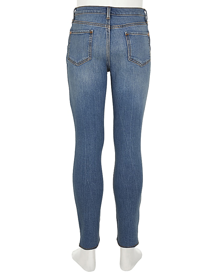 Girls blue mid rise skinny jeans