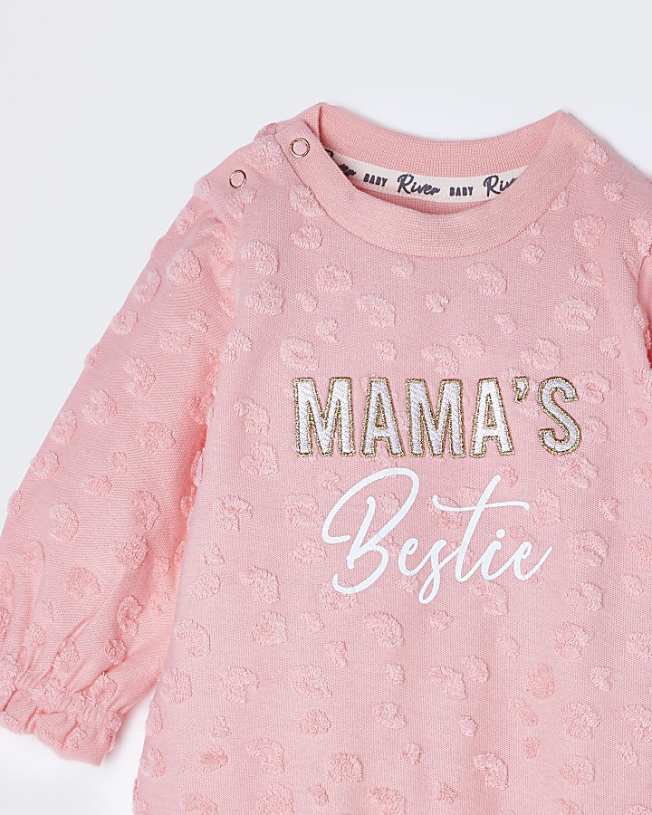 Baby coral 'Mamas Bestie' baby grow