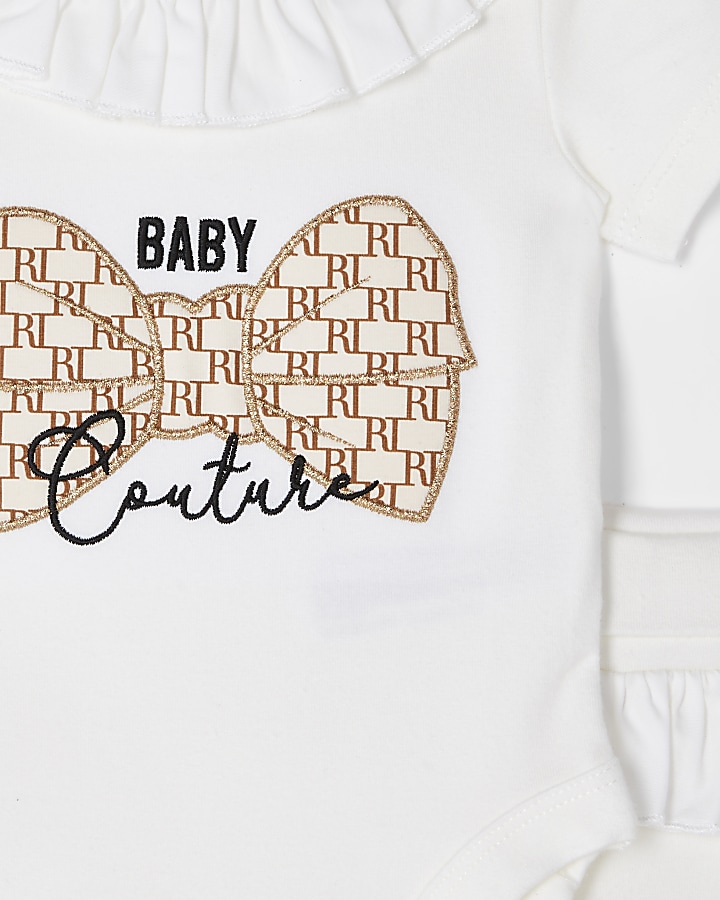 Baby white 'couture' babygrow outfit