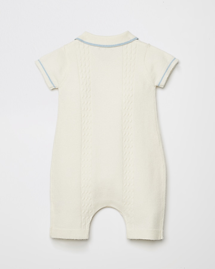 Baby beige cable knitted polo baby grow