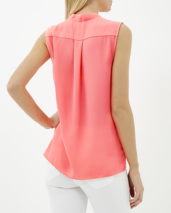 Coral wrap front sleeveless blouse