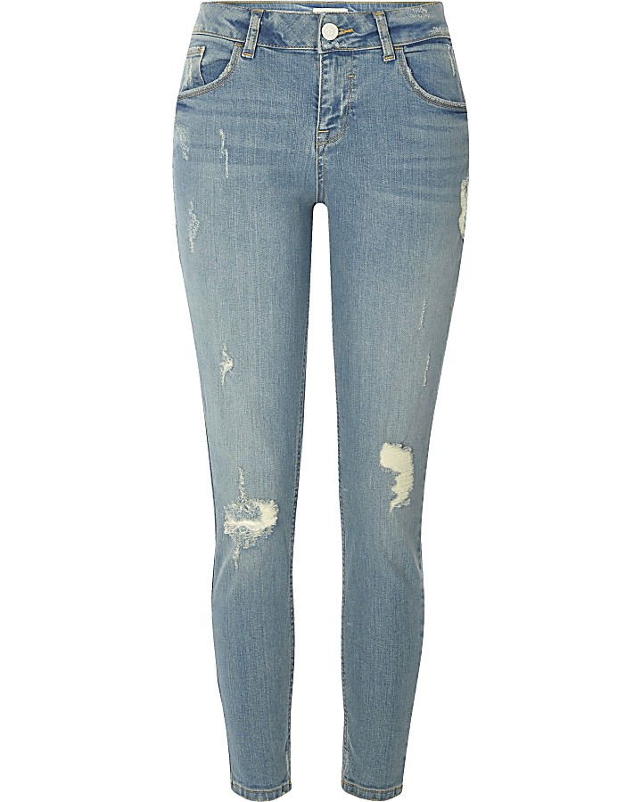 Light blue ripped relaxed skinny fit jeans