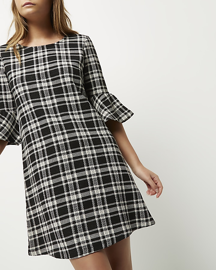 Black and white check flute sleeve dress