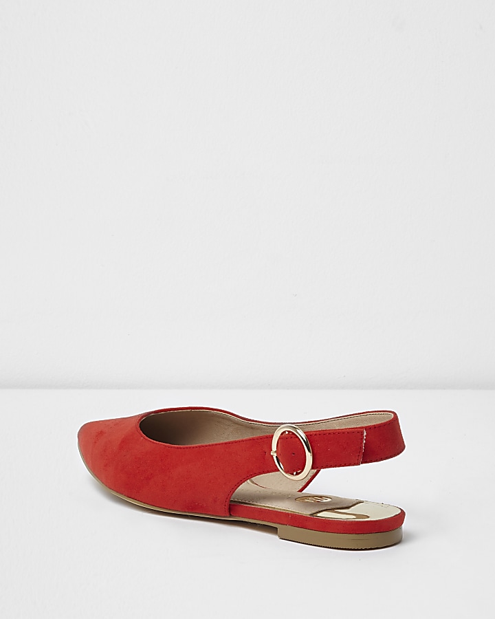 Red pointed slingback shoes