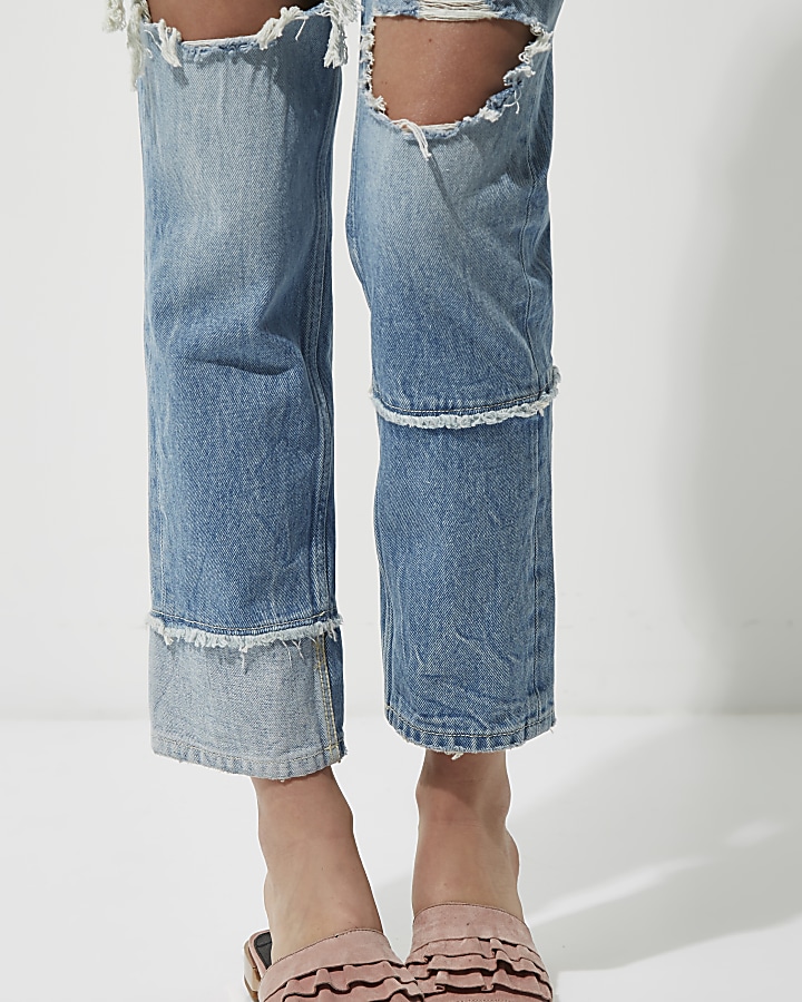 Mid blue ripped seam straight leg jeans