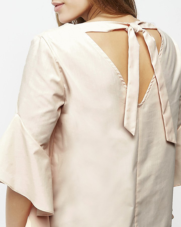 Light pink frill sleeve tie back V neck top