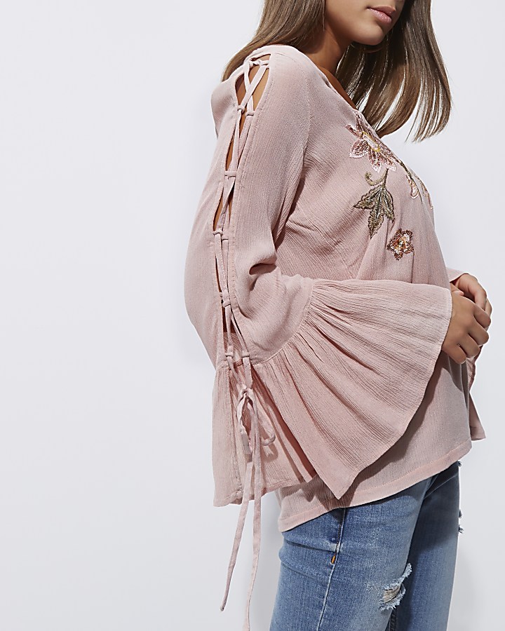 Pink floral embroidered flared sleeve top