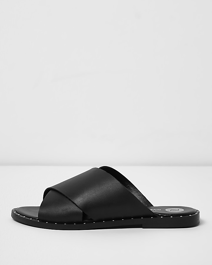 Black leather cross strap studded mules