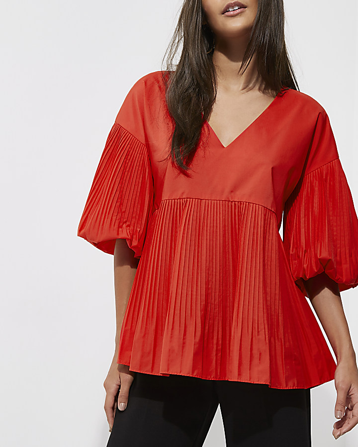 Red pleated V neck puff sleeve top