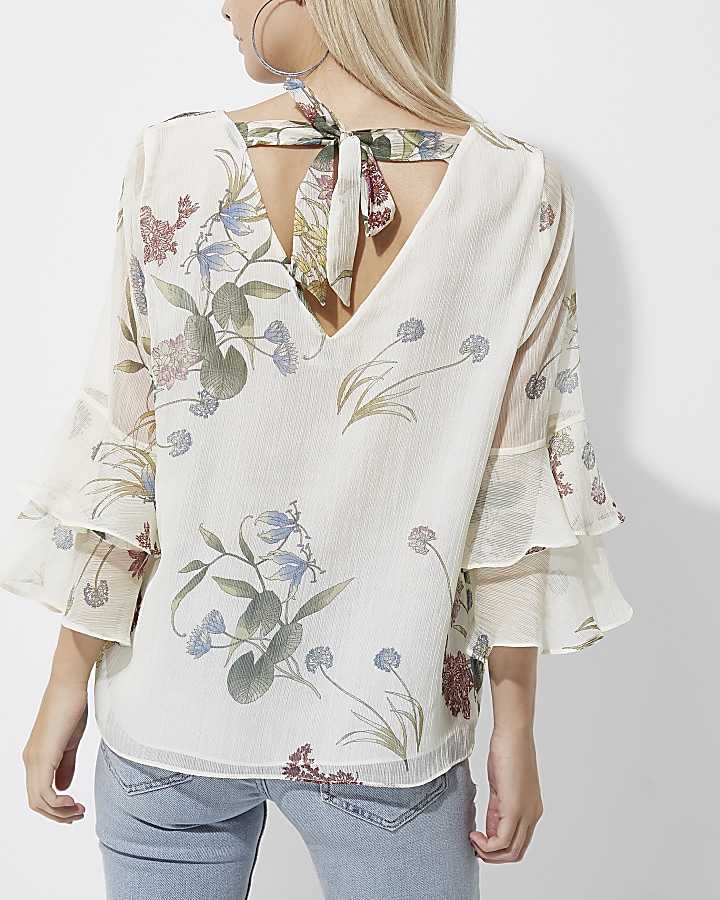 Petite cream floral frill bell sleeve top