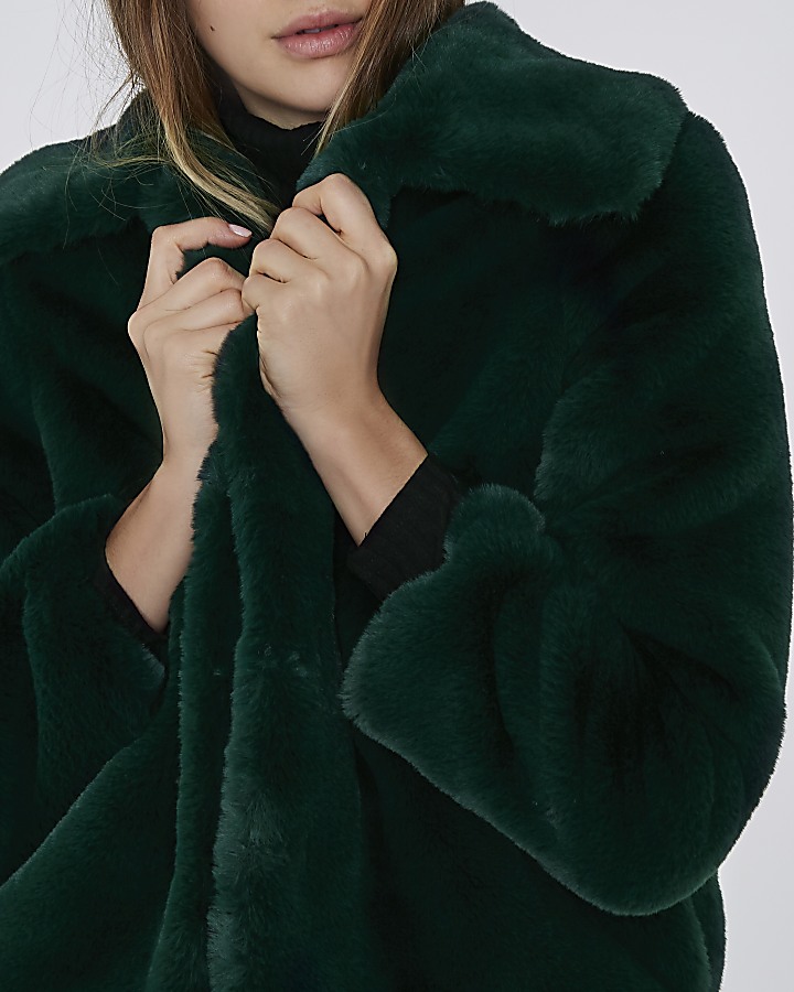 Green faux fur puffball coat