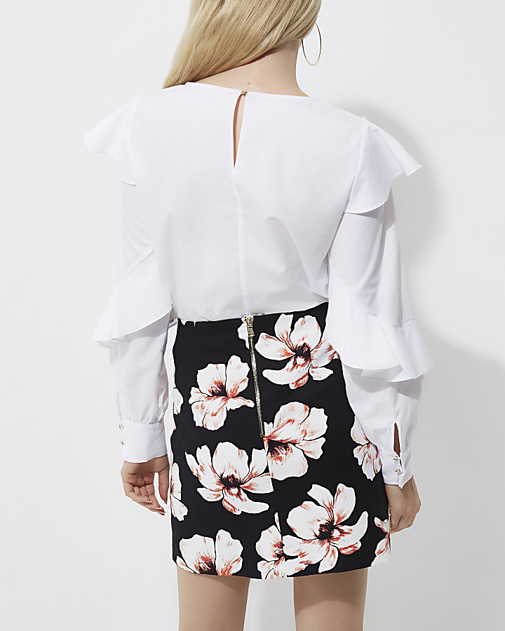 Black floral print mini skirt