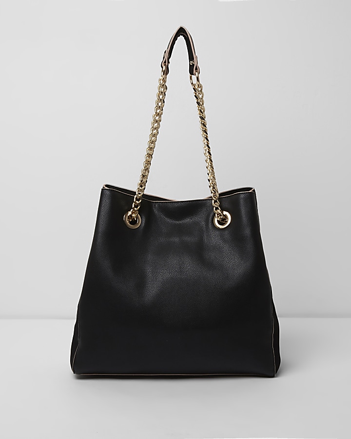 Black quilted chain slouch tote bag