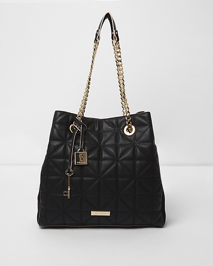 Black quilted chain slouch tote bag
