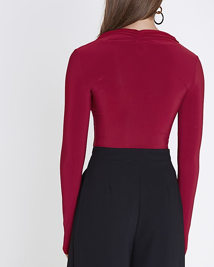Red cross twist neck fitted long sleeve top