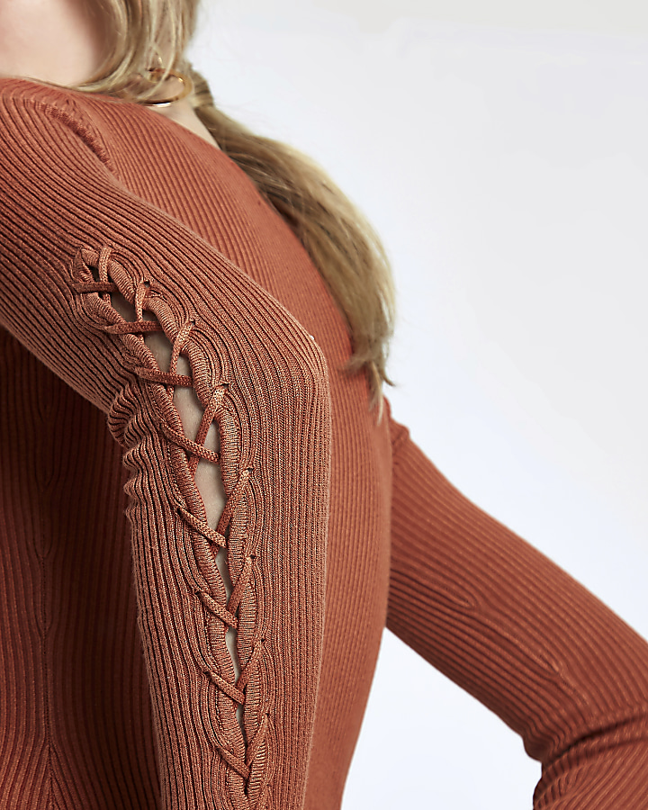 Dark orange rib knit lace-up sleeve top