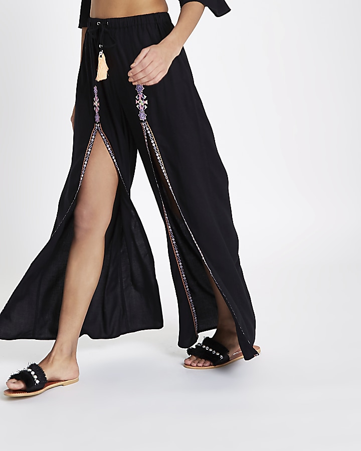 Black split embroidered palazzo trousers