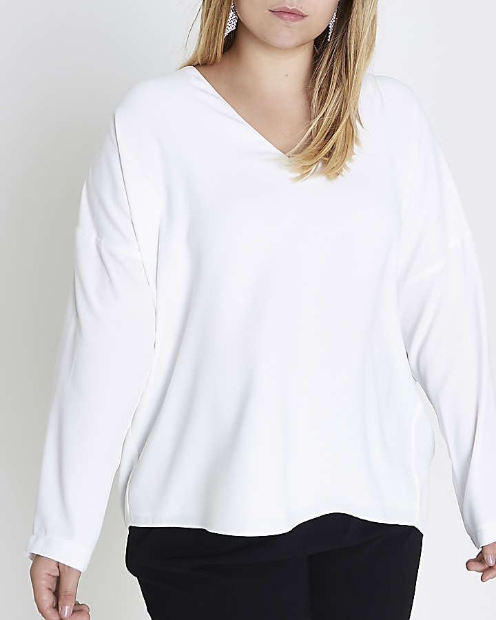 Plus cream lace-up back long sleeve top