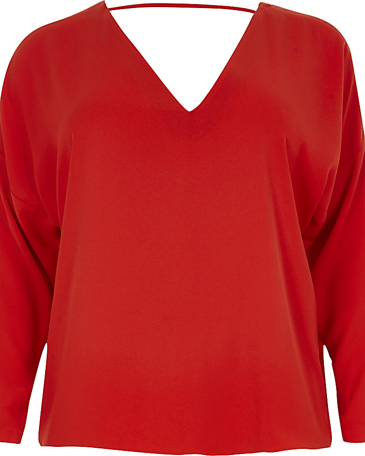 Plus red lace-up back long sleeve top