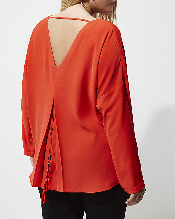 Plus red lace-up back long sleeve top