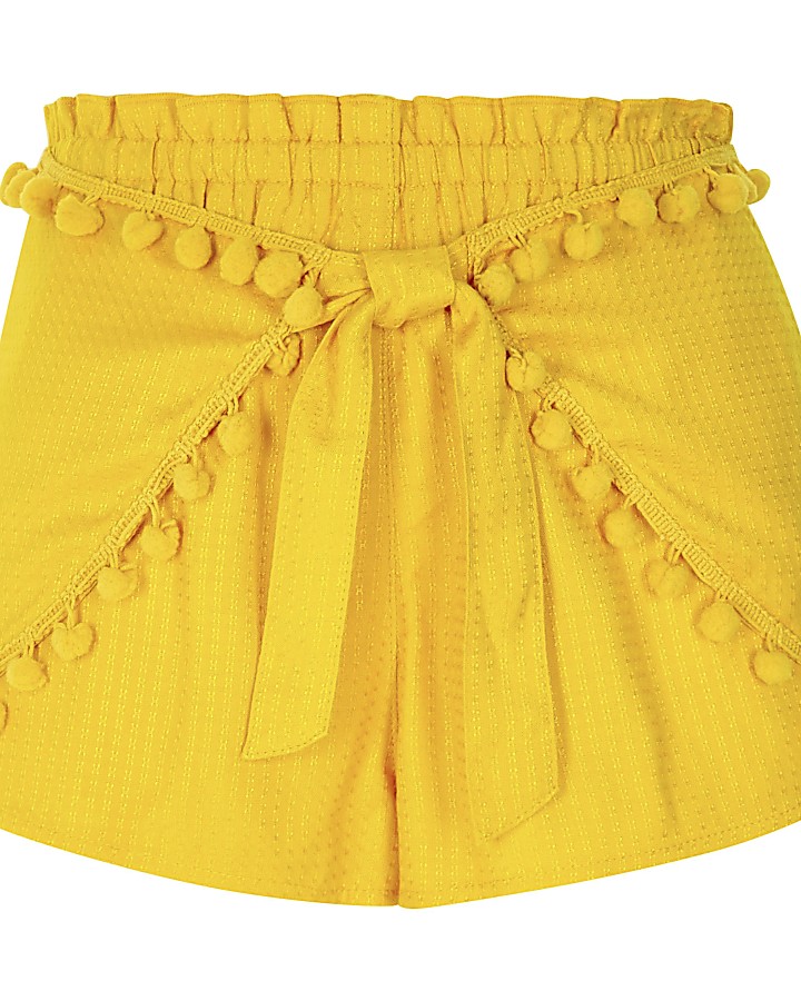 Yellow pom pom tie front beach shorts