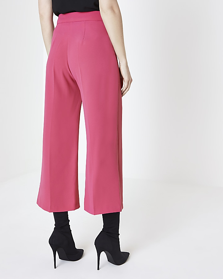 Bright pink belted culottes