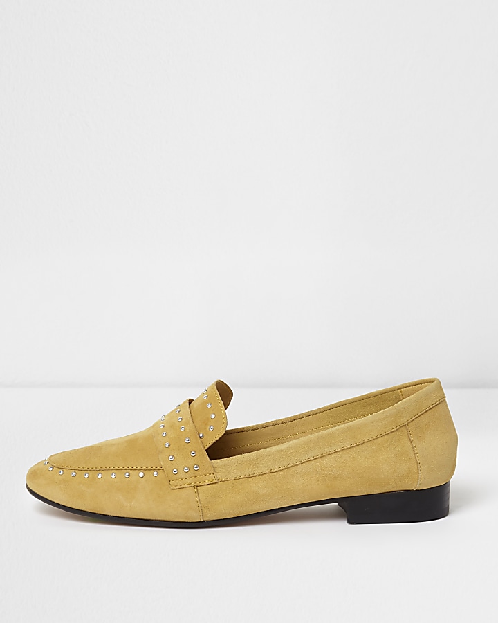 Yellow suede studded loafers