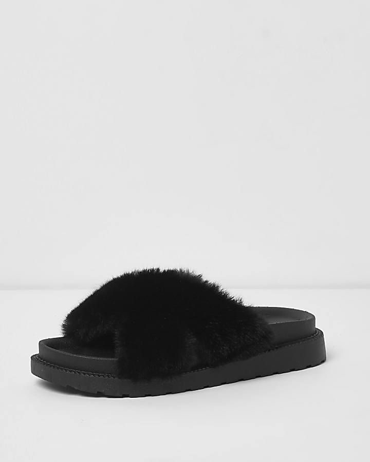 Black faux fur cross strap sliders