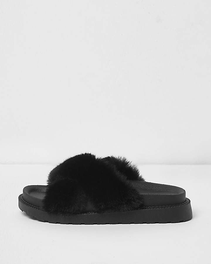 Black faux fur cross strap sliders