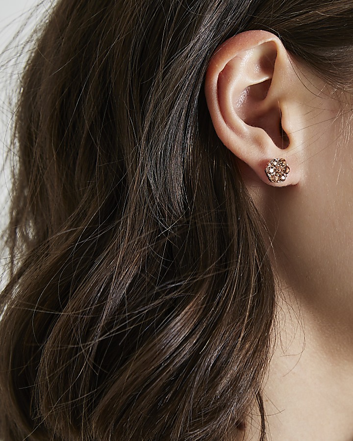 Rose gold tone flower stud earrings