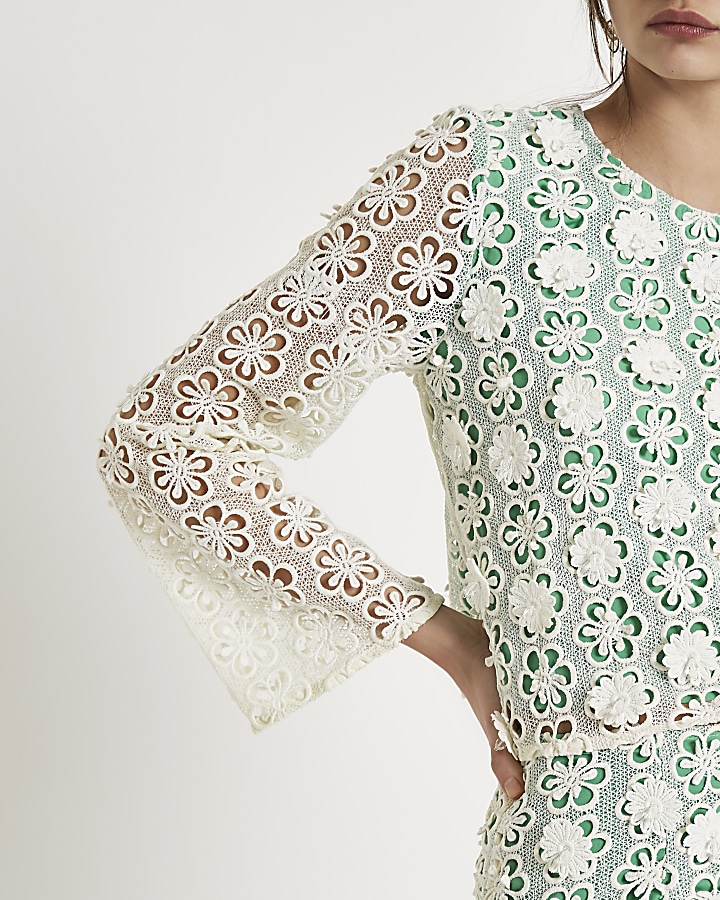 Green floral lace embellished top