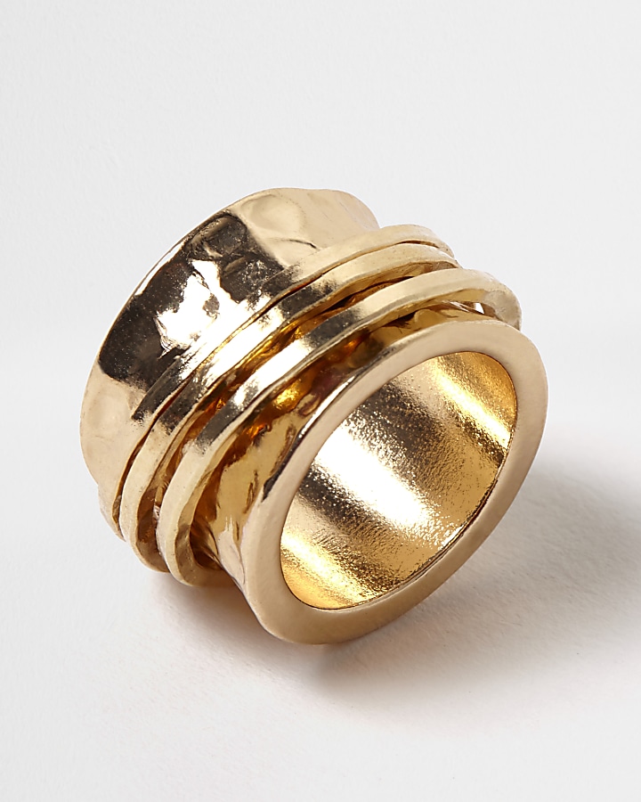 Gold tone hammered spinner ring