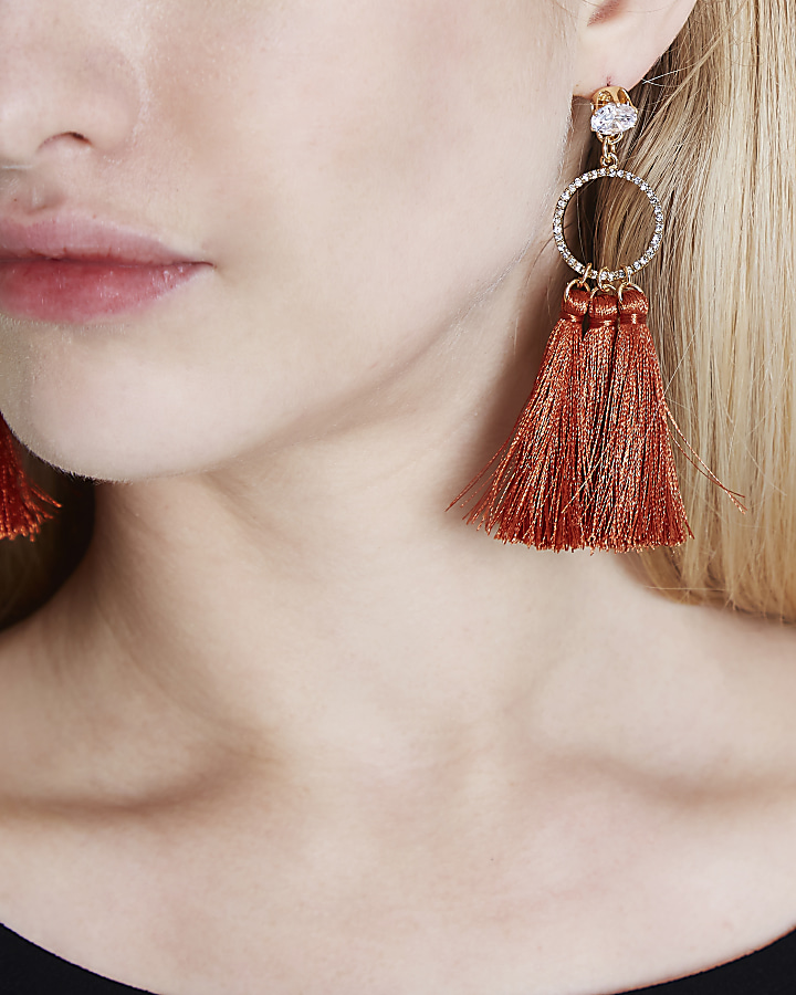 Orange diamante circle tassel drop earrings
