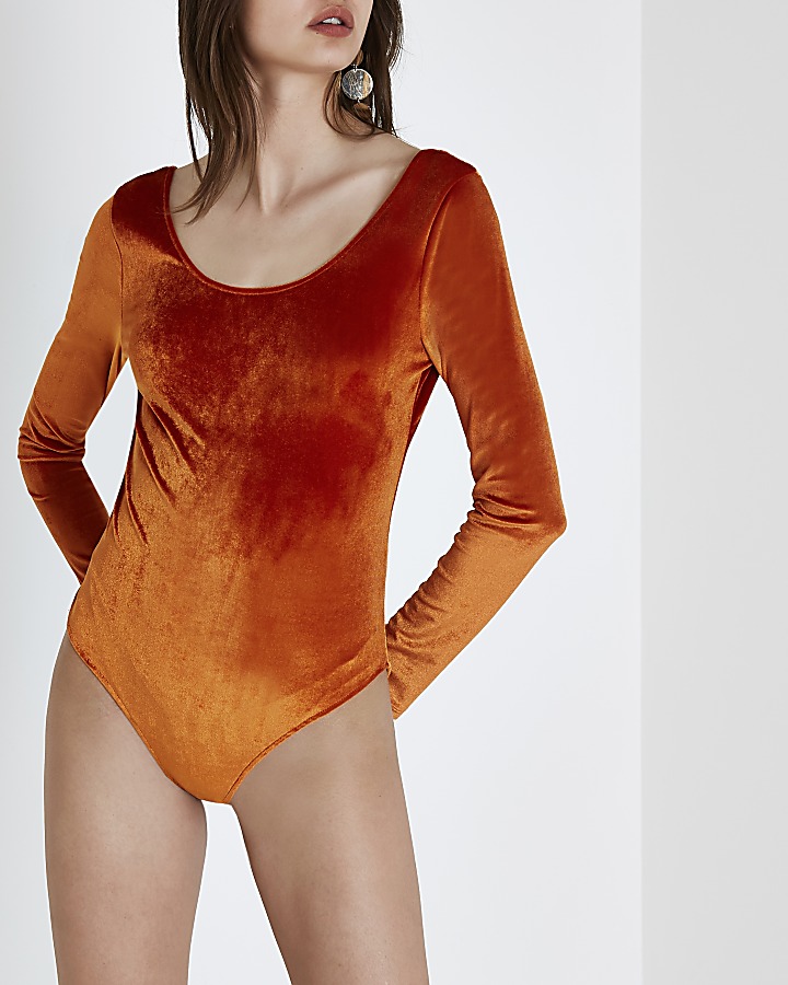 Orange velour long sleeve scoop neck bodysuit