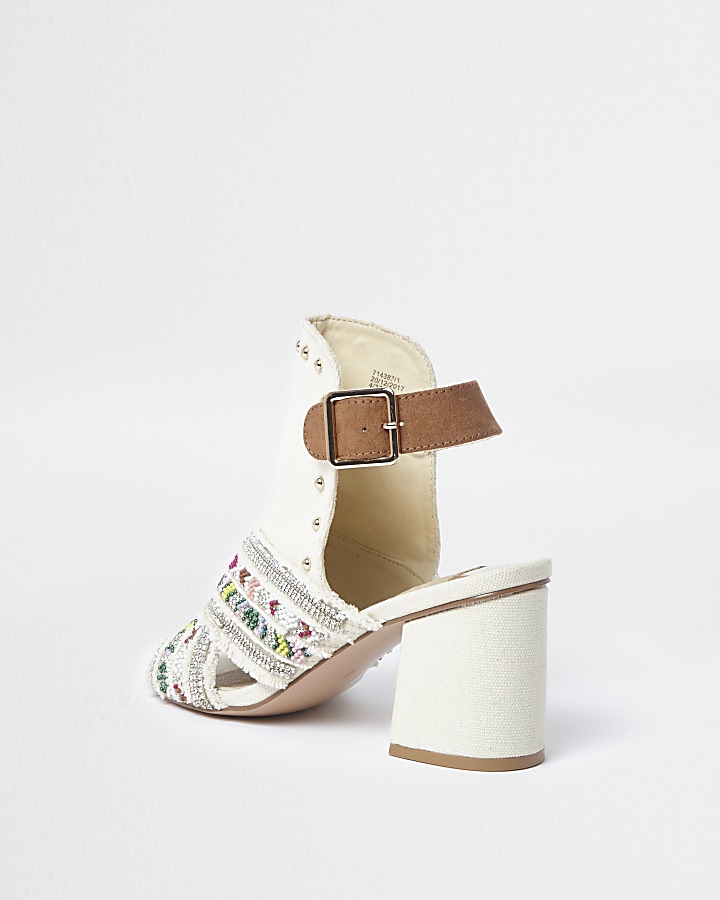 Cream embellished block heel shoe boots