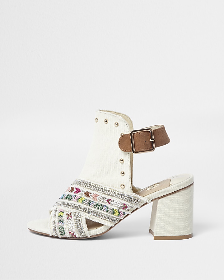 Cream embellished block heel shoe boots