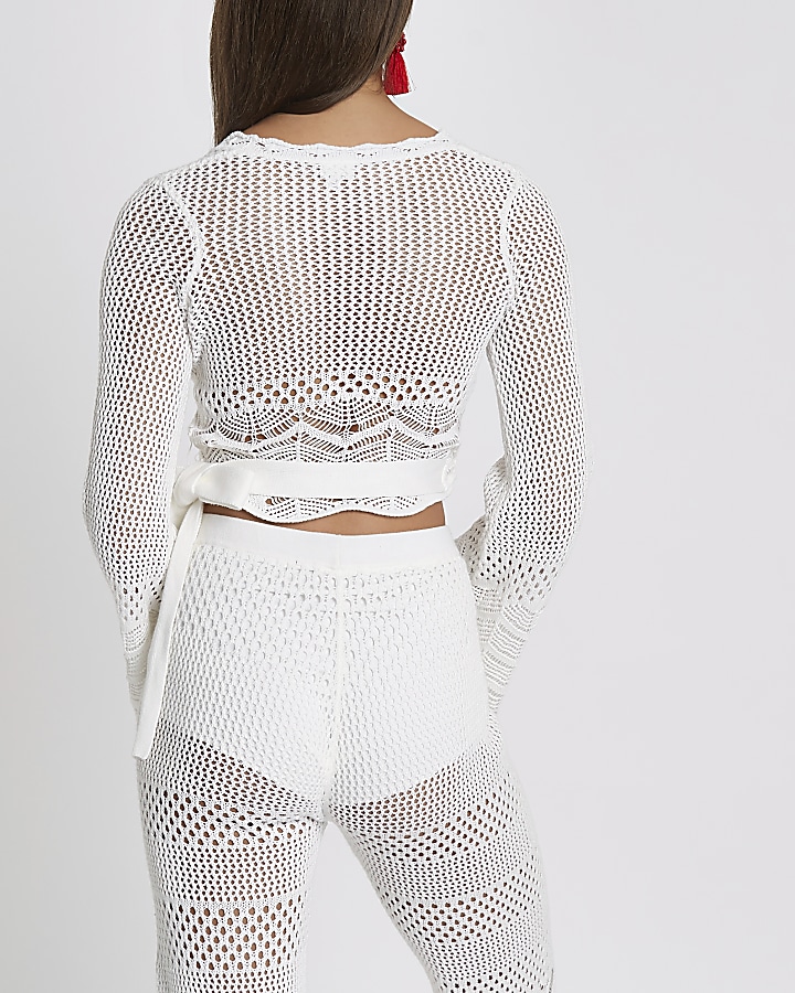 White crochet knit wrap flare sleeve top