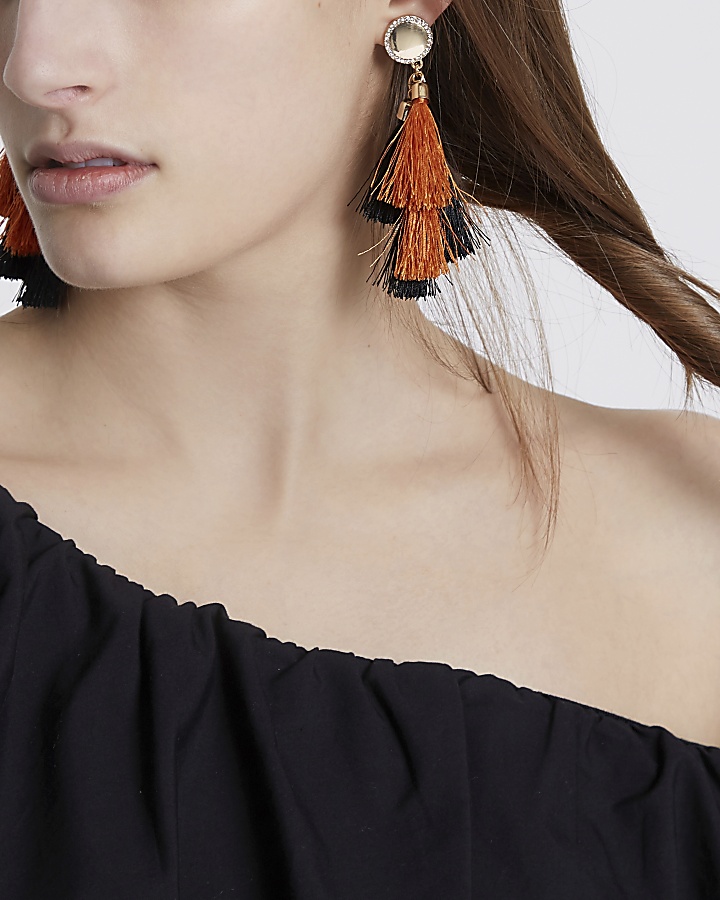 Orange tassel drop earrings