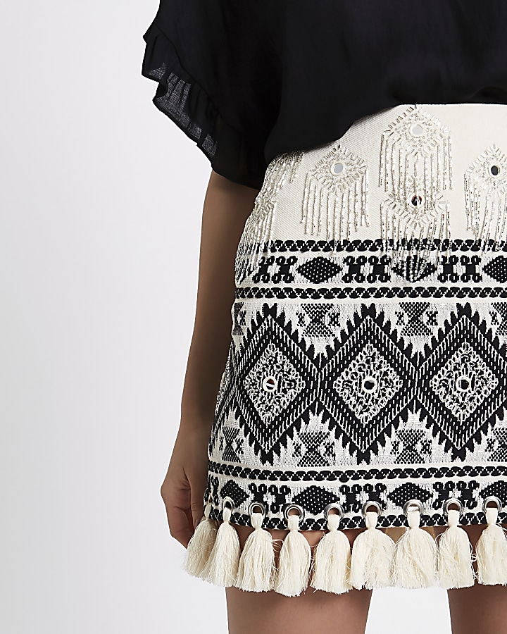 Cream embroidered tassel hem mini skirt
