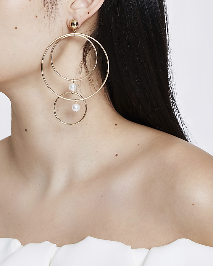 Gold tone multi hoop pearl stud earrings