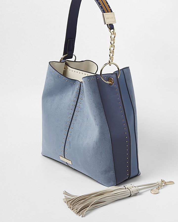 Blue studded tassel side slouch tote bag