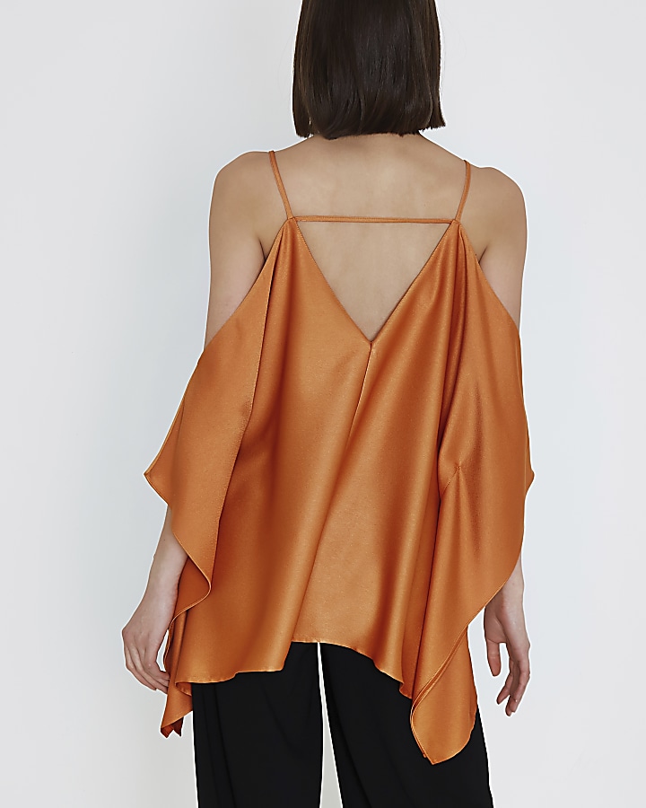 Orange satin cold shoulder cape sleeve top