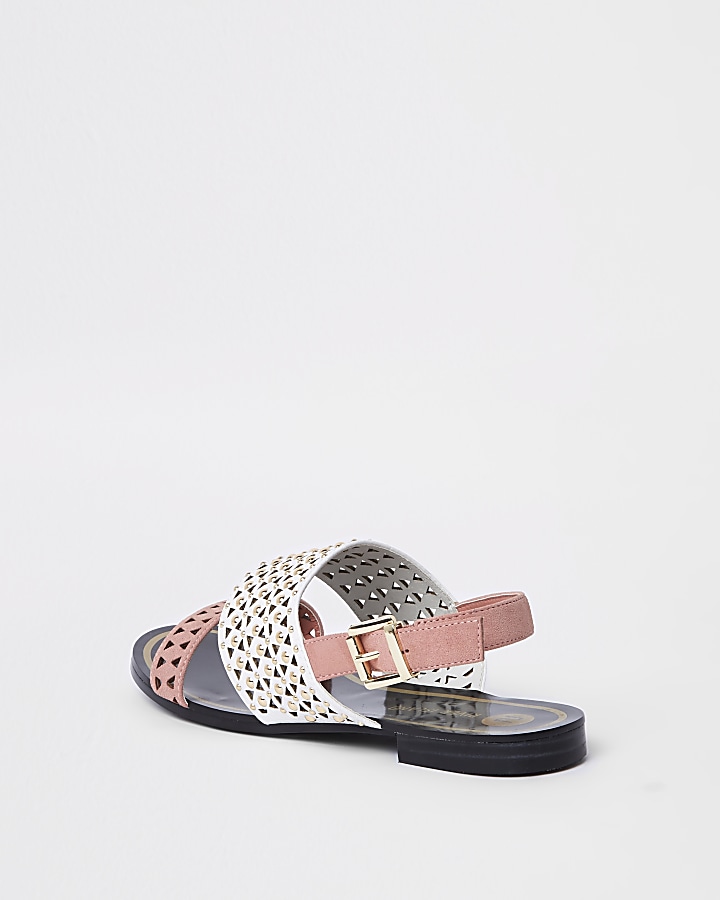 White and pink laser cut sandals