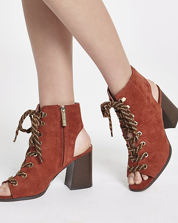 Orange lace-up block heel shoe boots