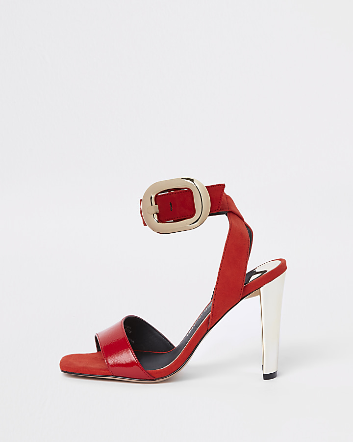 Red oversized gold tone buckle sandal